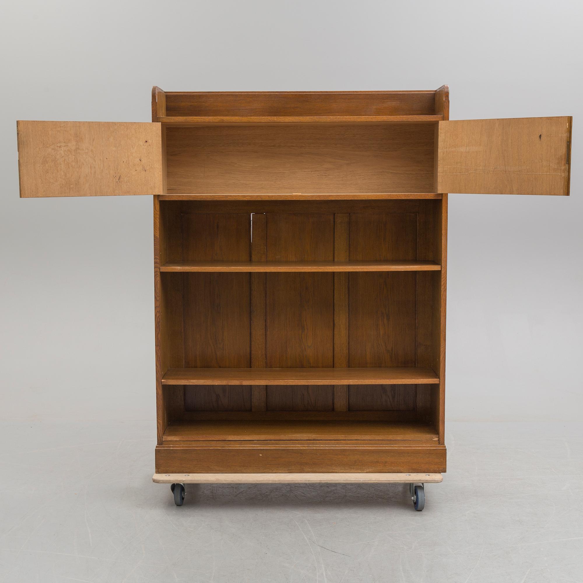 An early 20th century bookcase /  cabinet.