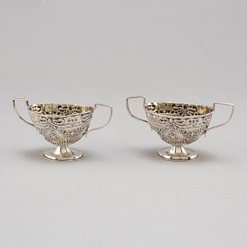 Charles Westwood & Sons, a pair of, silver salt cellars, Birmingham 1899.