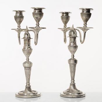 A pair of English silver candelabra, mark of Hawksworth, Eyre & Co Ltd, Sheffield 1892.