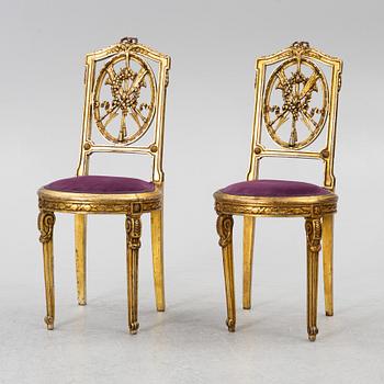 A pair of chairs,  Louis XVI style, from around the year 1900.