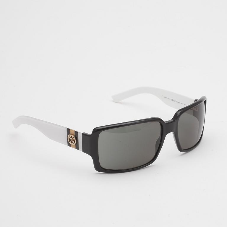 SOLGLASÖGON, Gucci.