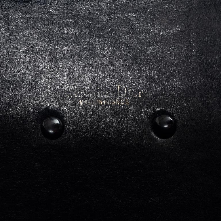 Christian Dior, Translation: "clutch, vintage".