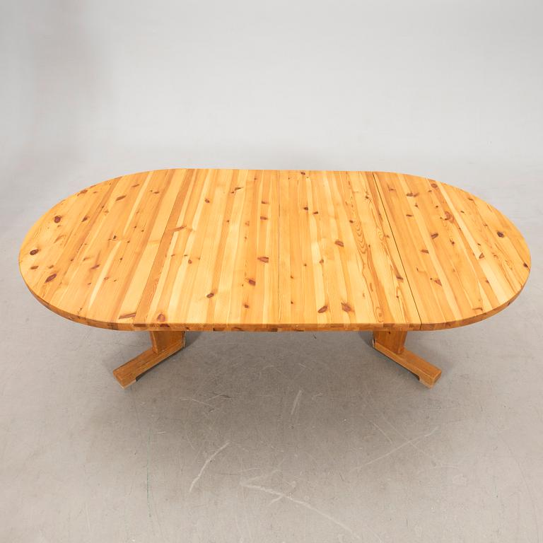 A pine dining table, 1970s.