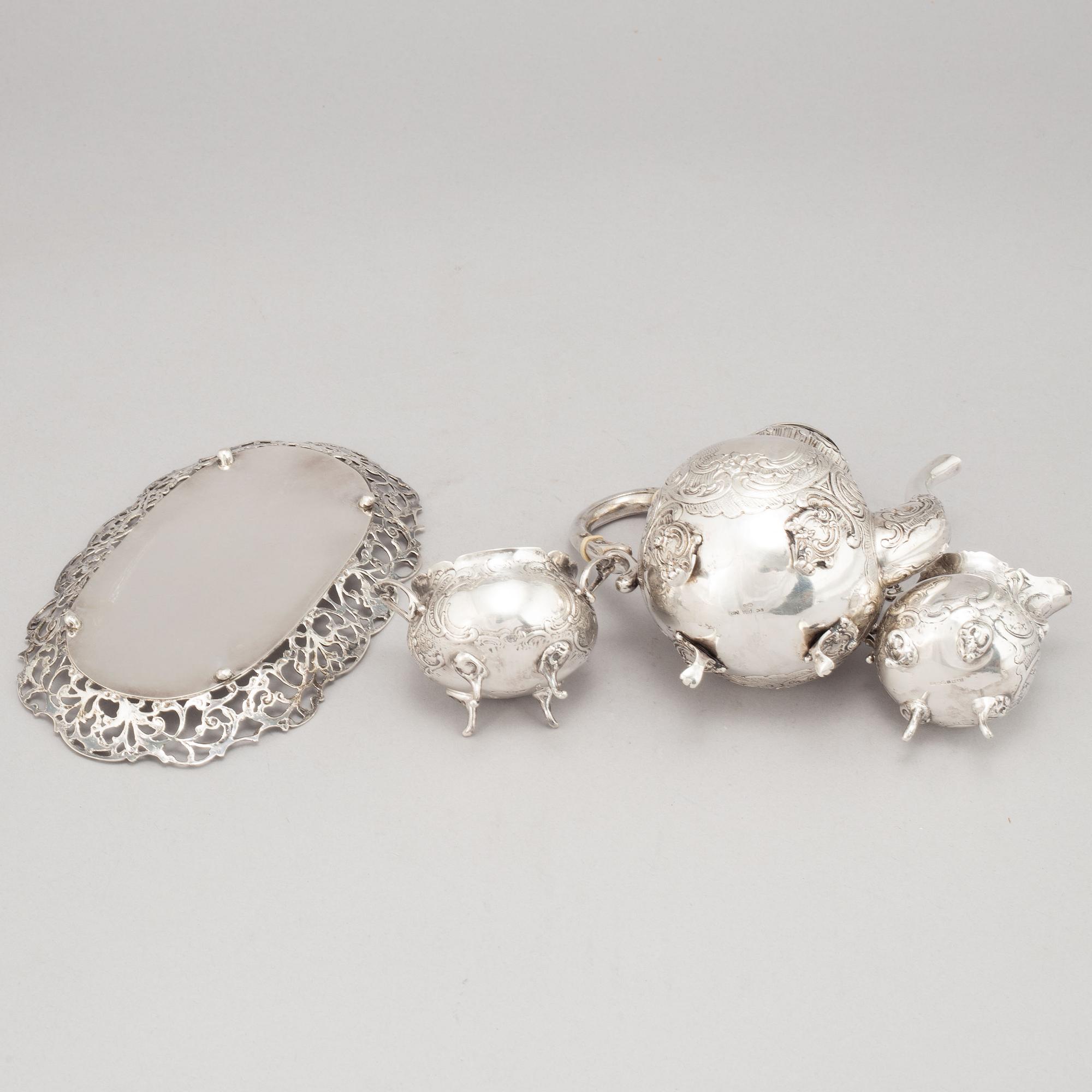 A silver mocha pot, creamer, sugar bowl and tray, some with mark of Gewe, Malmö 1950-51.