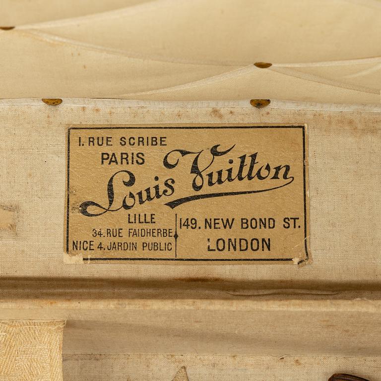 Louis Vuitton, orange Steem Trunk from the early 20th century.