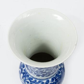 Two blue and white vases, Qing dynasty, 19th century and a blue and white vase with cover, 18th century.