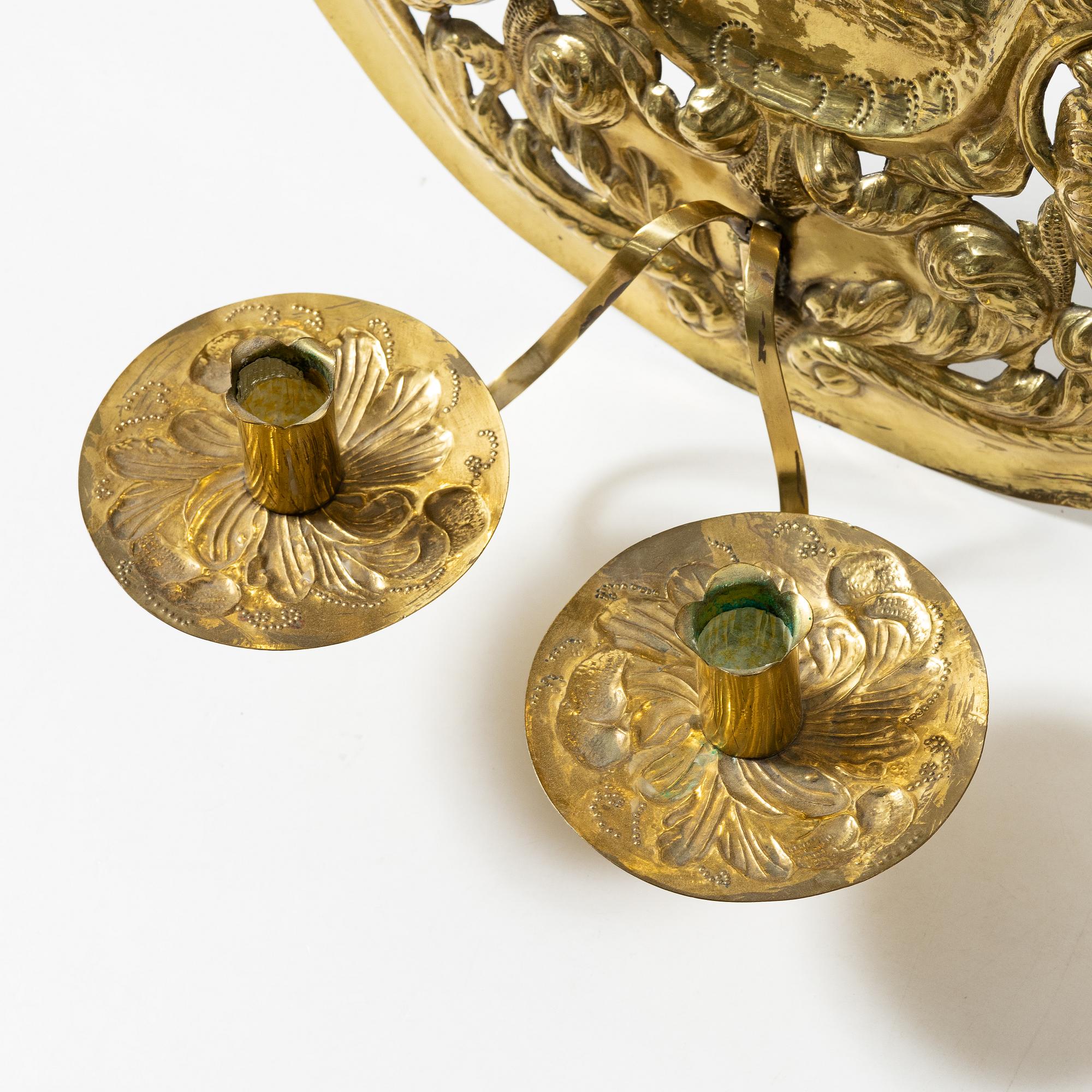 A pair of  Swedish Baroque style brass light plates, Johan F Hellström, Nyköping around the year 1900.