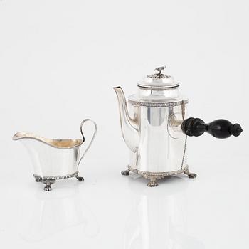 Jacob Engelbert Torsk, a late Gustavian style silver coffee pot and a creamer, Stockholm, 1908-1909.