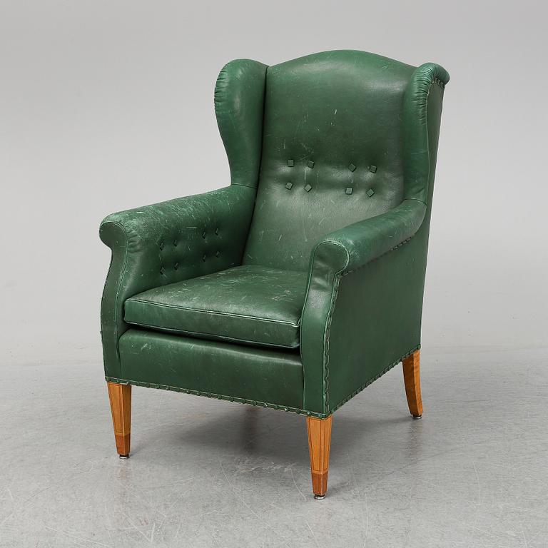 A leather wing-chair.