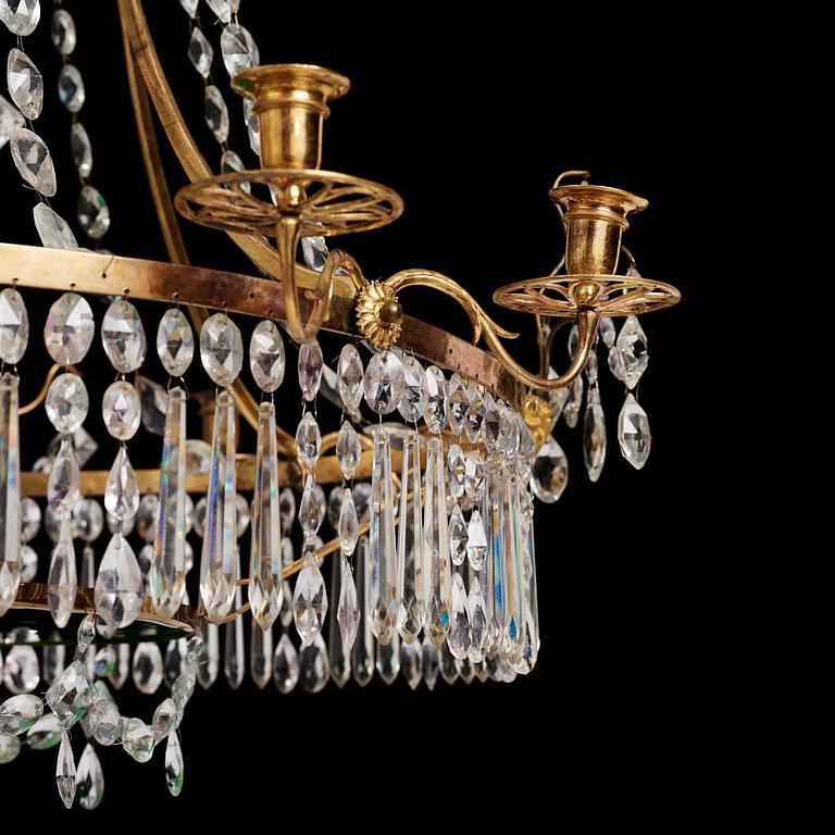 A German Louis XVI ormolu and cut-glass nine-light chandelier attributed to Johann Christoph Ermisch, late 18th century.