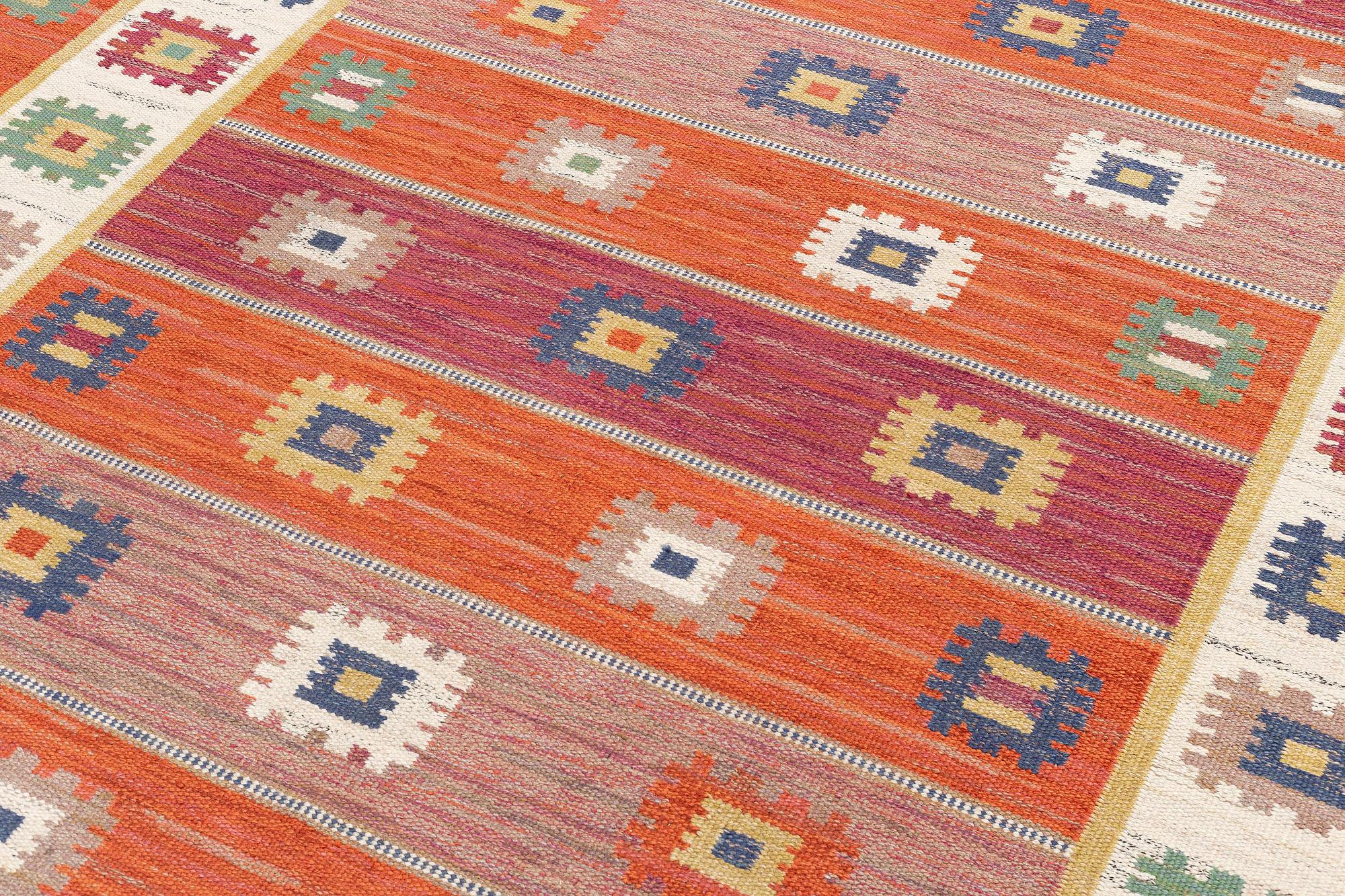 Märta Måås-Fjetterström, a carpet, 'Röd grön äng', flat weave, c. 345 x 251 cm, signed AB MMF.