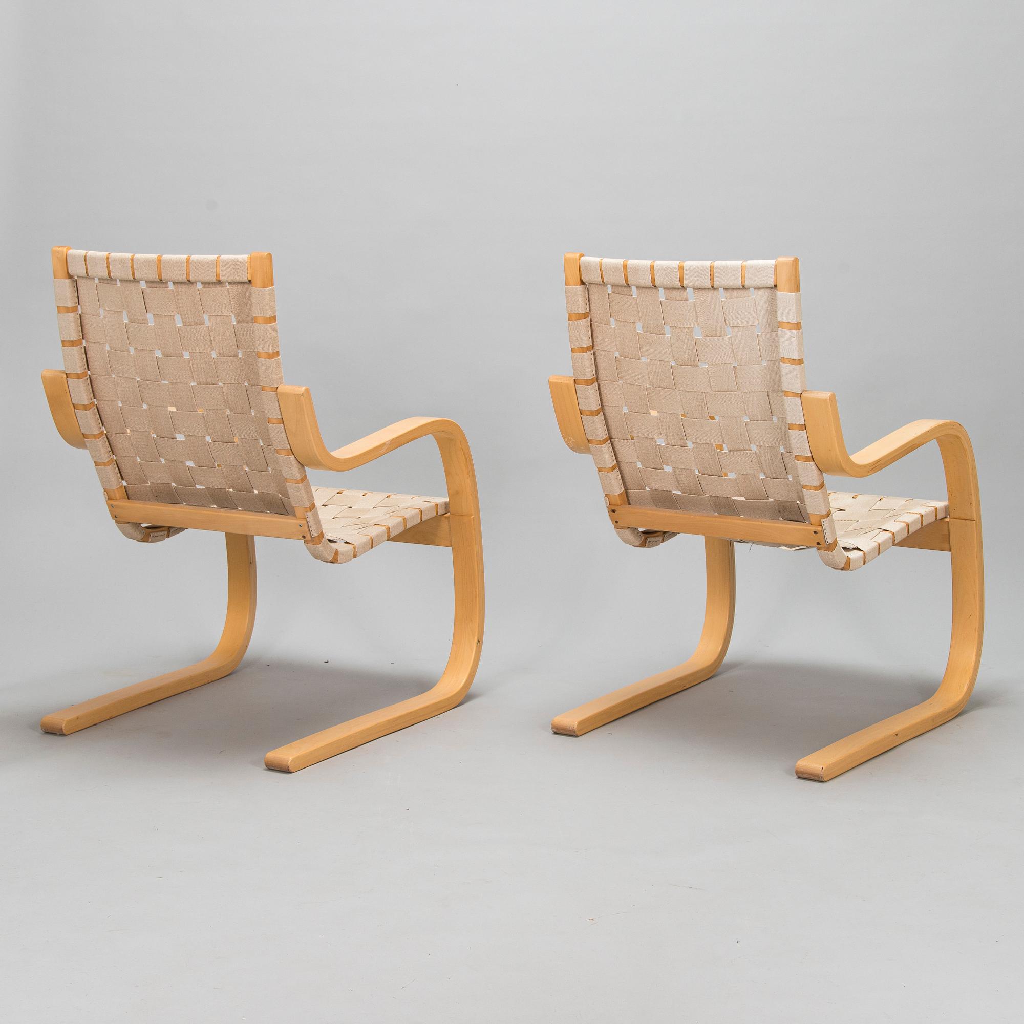 Alvar Aalto, a pair of late 1900s '406' armchairs for Artek.