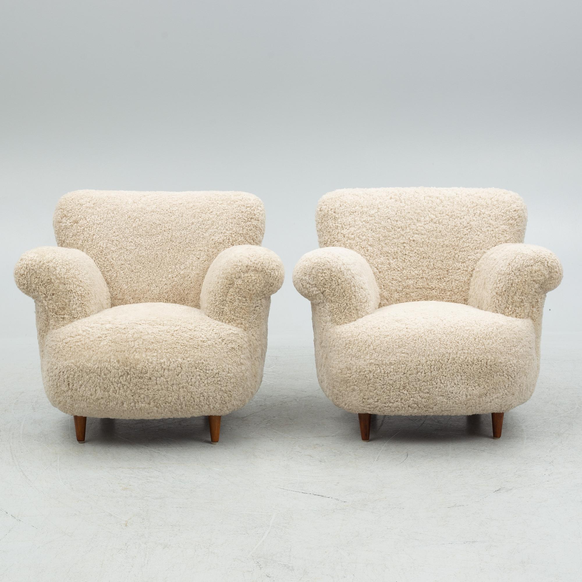 A pair of Swedish Modern easy chairs, mid 20th century.