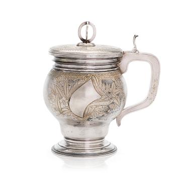 A parcel-gilt silver tankard, maker's mark of Petr Chumakov, Moscow 1895.