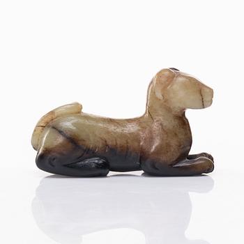 A sculptured nephrite figure of a dog, Qing dynasty.