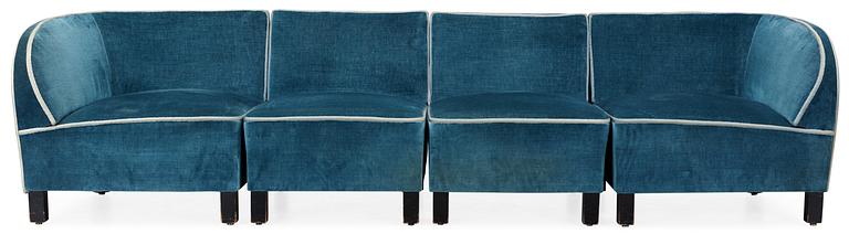 Otto Schulz, An Otto Schulz blue velvet sofa in four sections.