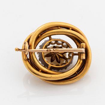 A 14K gold brooch set with a pearl and old-cut diamonds.