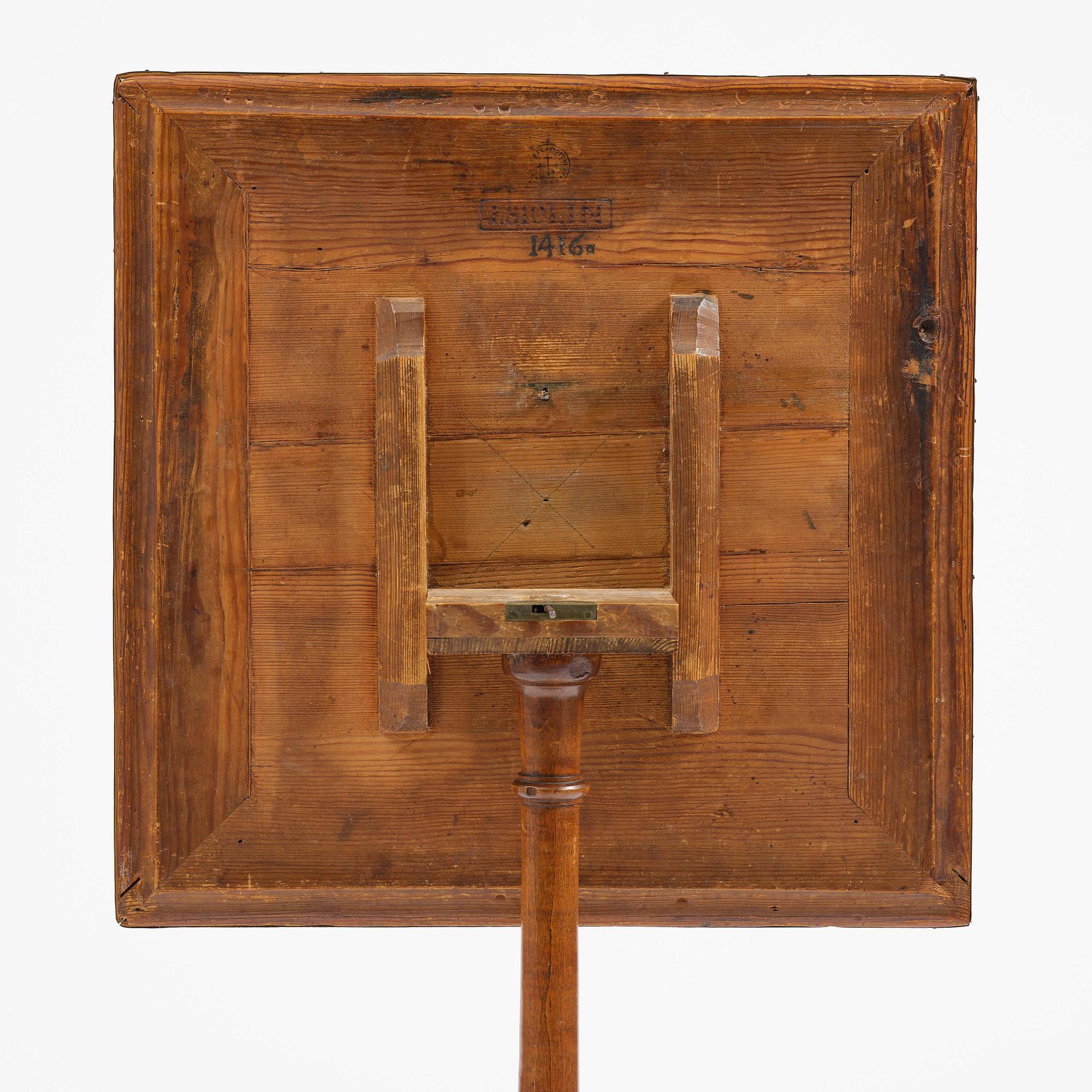A burr-alder tilt-top table by J. Sjölin (master 1767-85).