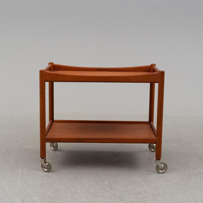 A mid 20th century teak serving trolley by Hans J Wegner, Andr. Tuck, Denmark.