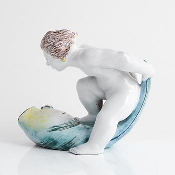 Tyra Lundgren, a faience figurine, Rörstrand, dated -30.
