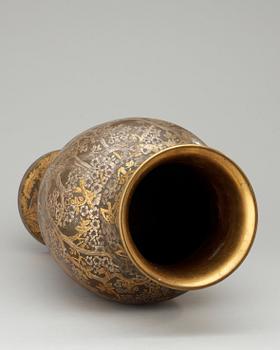 A Hjalmar Norrström etched and engraved patinated gilt copper vase, Stockholm 1904.