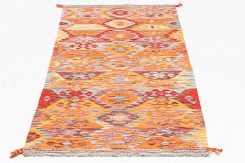A Kilim runner, c. 255 x 85 cm.