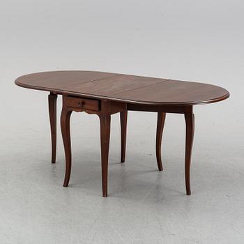 A stained pine gate-leg table, Åmells möbler.