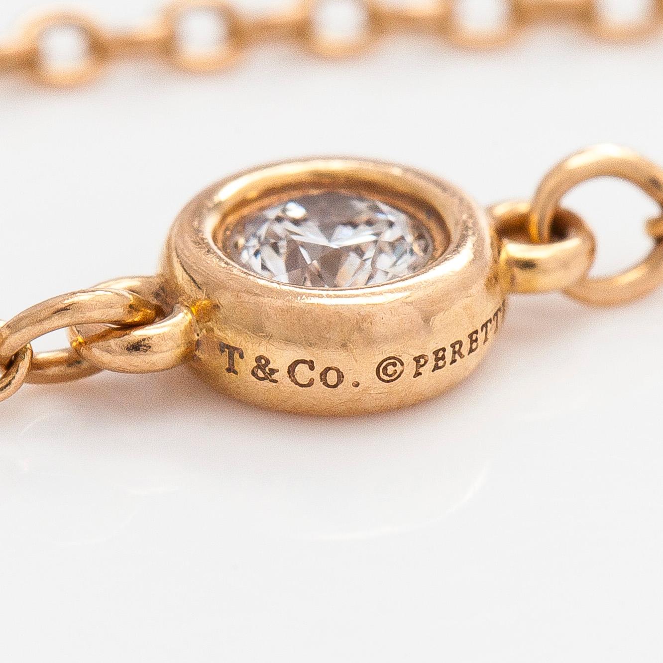 Tiffany & Co, Elsa Peretti, an 18K gold 'Diamonds by The Yard' ring with a brilliant-cut diamond.