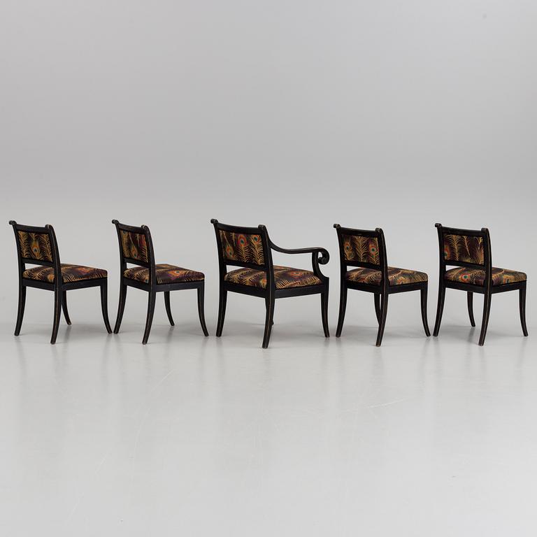 A set of an early 20th century armchair and three easy chairs.