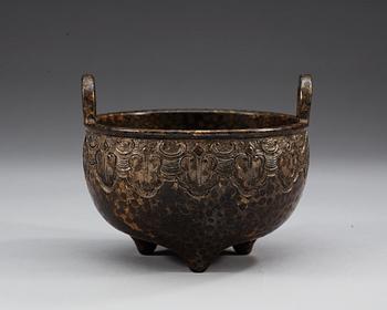 A bronze imitating porcelain tripod censer, presumably late Qing dynasty with Qianlong seal mark.
