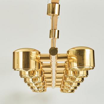 Hans-Agne Jakobsson, a 12 lights brass ceiling lamp, model 746/12, Markaryd Sweden, 1960-70's,