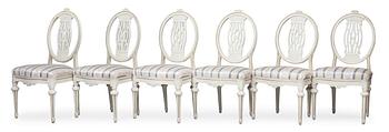A SET OF 6 CHAIRS.
