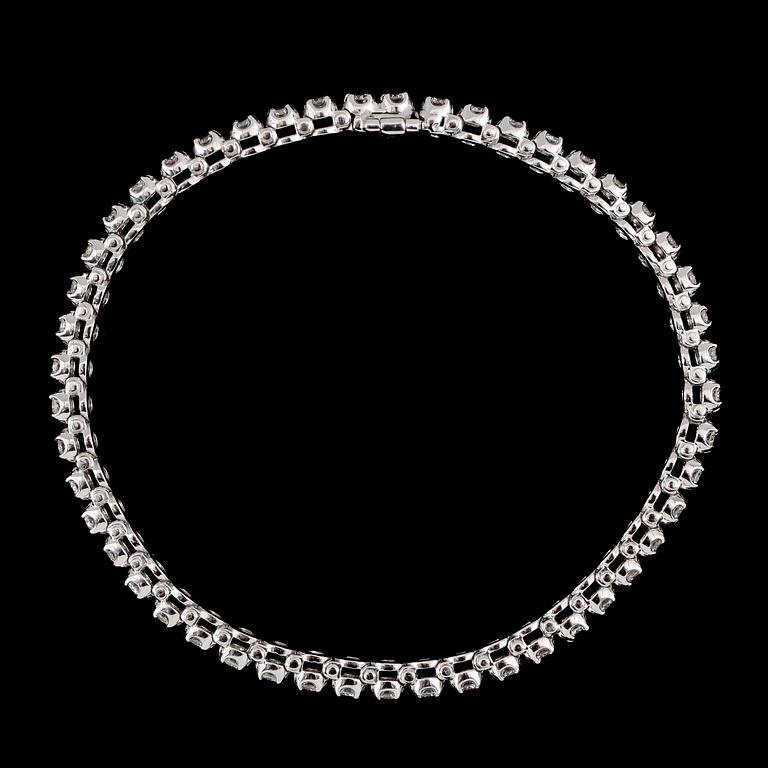 ARMBAND, 14 k vitguld, Rivière, 49 briljantslipade diamanter tot ca 2.80 ct.