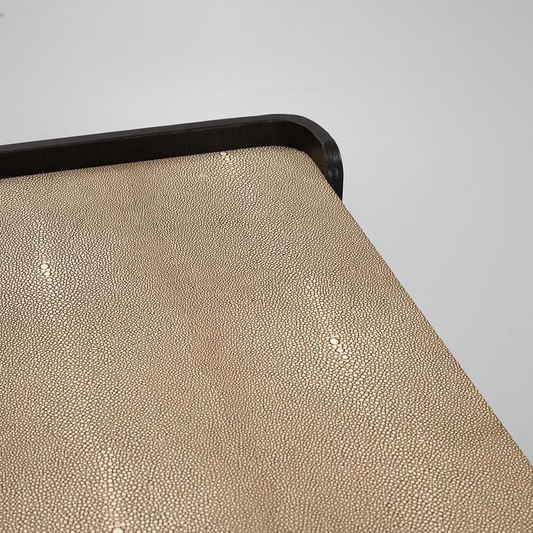 A black stained oak veneered 'Milano' dresser with top covering of faux stingray skin.