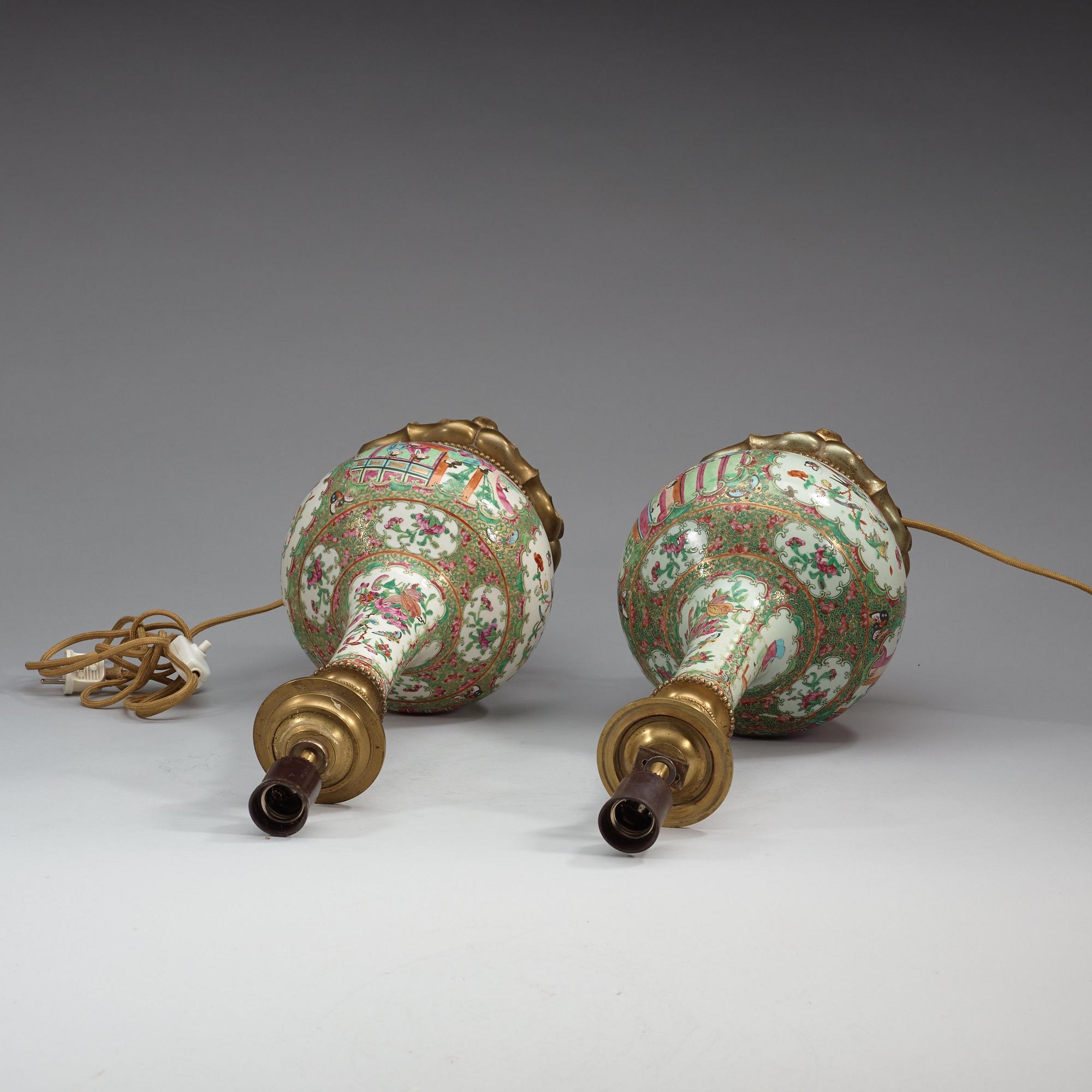 A pair of Canton famille rose lamps / vases, Qing dynasty, 19th century.