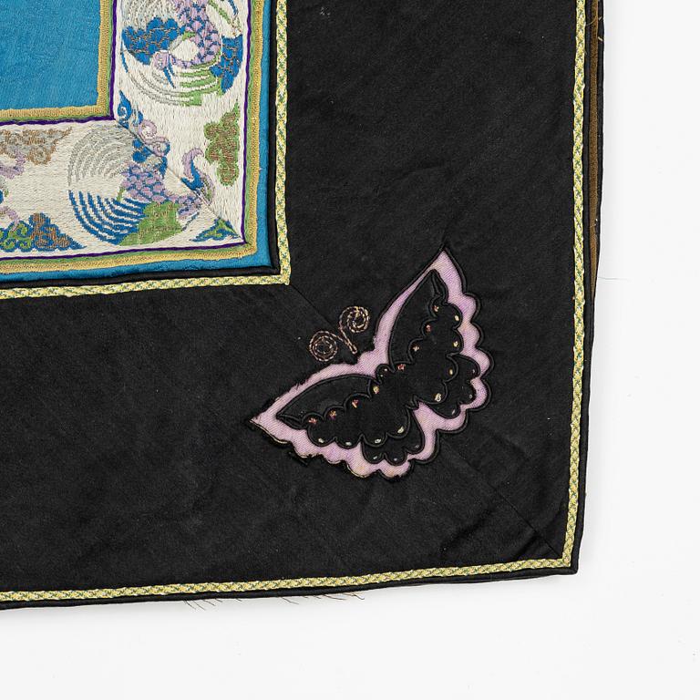 A female silk robe/over coat for winter, Qing dynasty, 19th century.