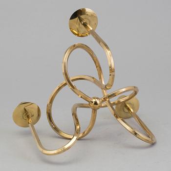 A brass candleholder "The knot of Friendship"design Josef Frank for Svenskt Tenn, Stockholm.