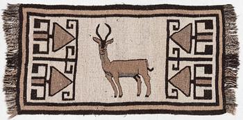 An oriental rug, c. 185 x 100 cm.