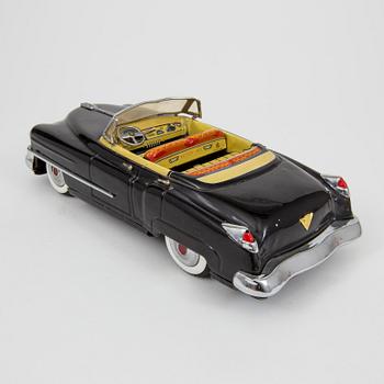 A Nomura Toys Cadillac Japan 1950s.