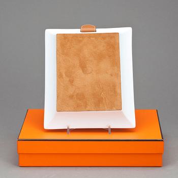 HERMÈS, a unglazed porcelain tray.