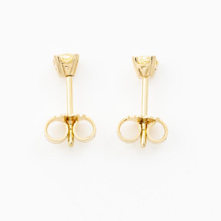 Earrings 14K gold with yellow radiant-cut diamonds.