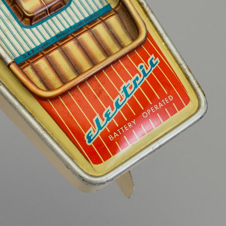 THREE TIN PLATE TOYS, mid 20th century.