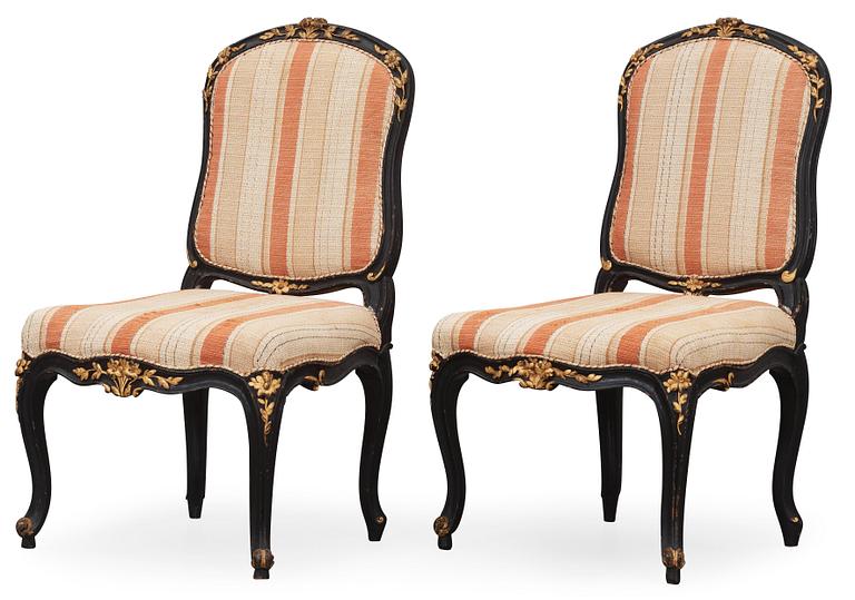 A pair of Louis XV chairs by F Reuze, master in Paris 1743.