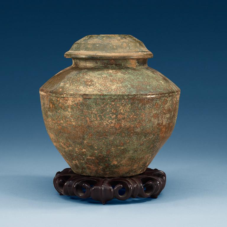 A green glazed jar with cover, Han dynasty (206 BC – 220 AD).