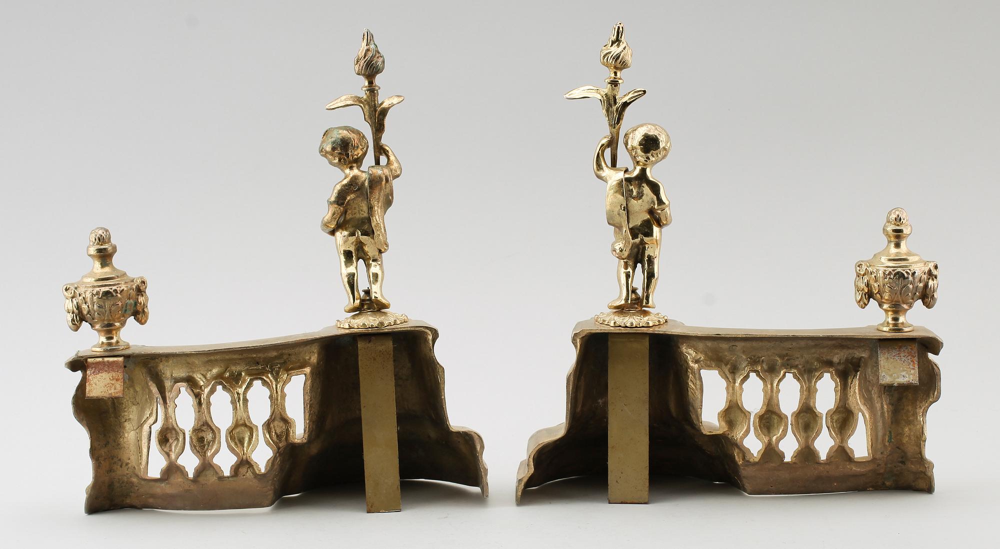 ELDHUNDAR, 1 par, förgylld metall, England, 1900-/2000-tal.