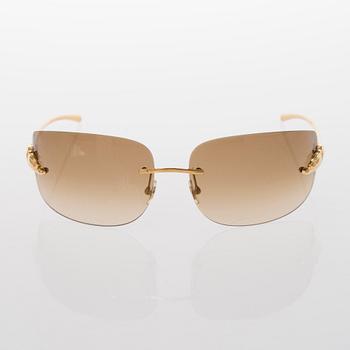 A pair of Panthère de Cartier Sunglasses.