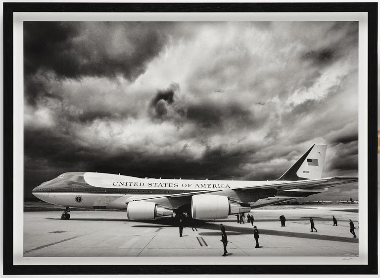 Brooks Kraft, "Storm clouds loom overhead as Air Force One and U.S. President George W. Bush arrive in Paris", 2003.
