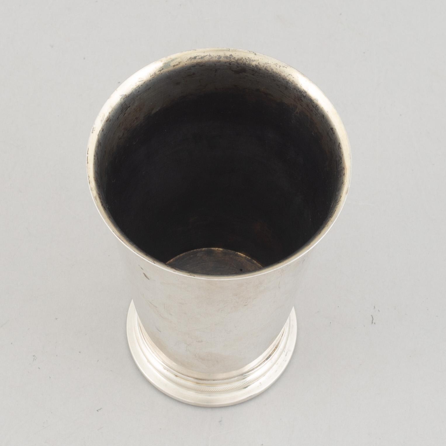 A Swedish silver beaker, an inkwell and a box, including Hugo Grun & Co, Stockholm 1948.