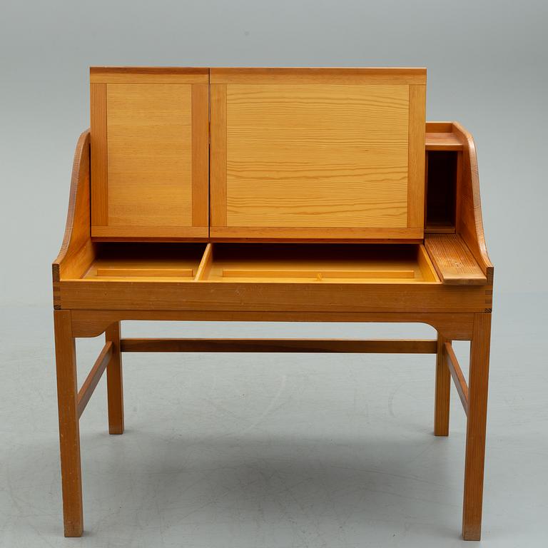 A mid 20th century writing desk by Andreas Hansen for Hadsten Träindustri, Denmark.