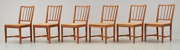 A suite of six Josef Frank mahogny dining chairs, Svenskt Tenn, model nr 815.